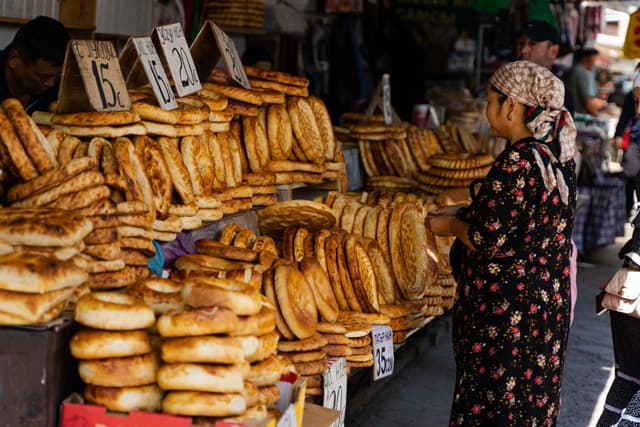 bread selling kyrgyz woman