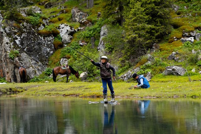 kyrgyzstan fishing boy